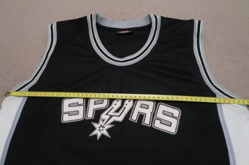 what is the black tape on basketball players jersey