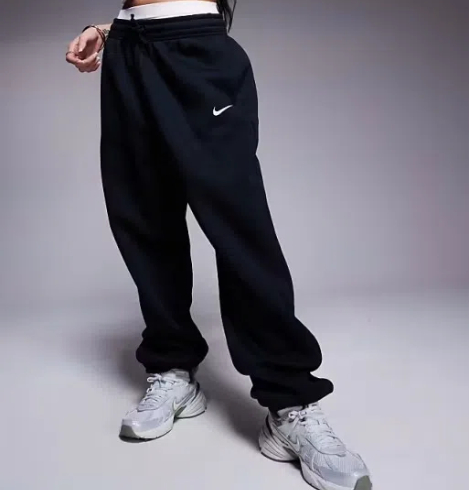 Nike Mini Swoosh sweatpants in black _ ASOS