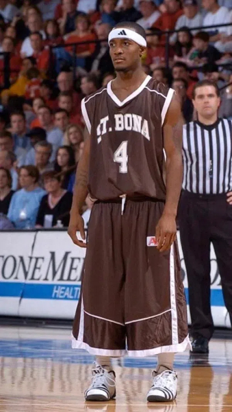who started long shorts in basketball