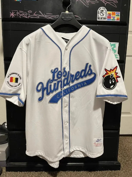 how big is a size 56 baseball jersey