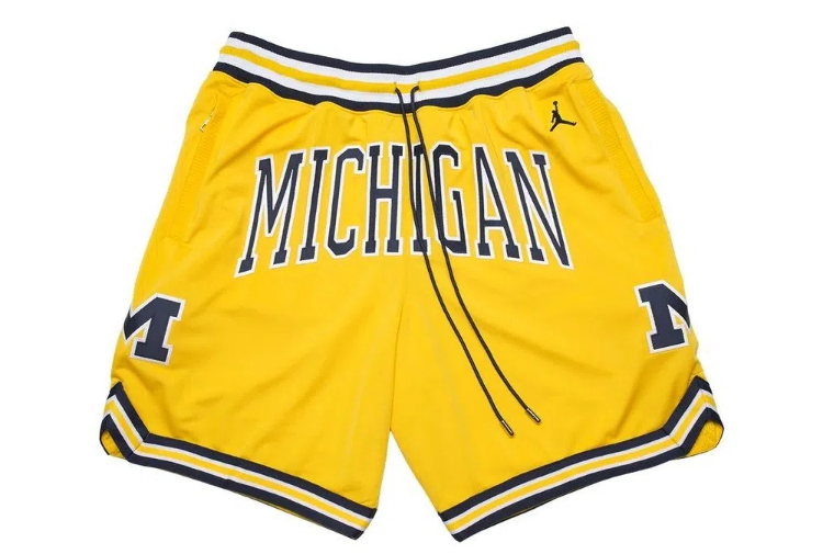 what is the yellow circle on michigan state basketball shorts2